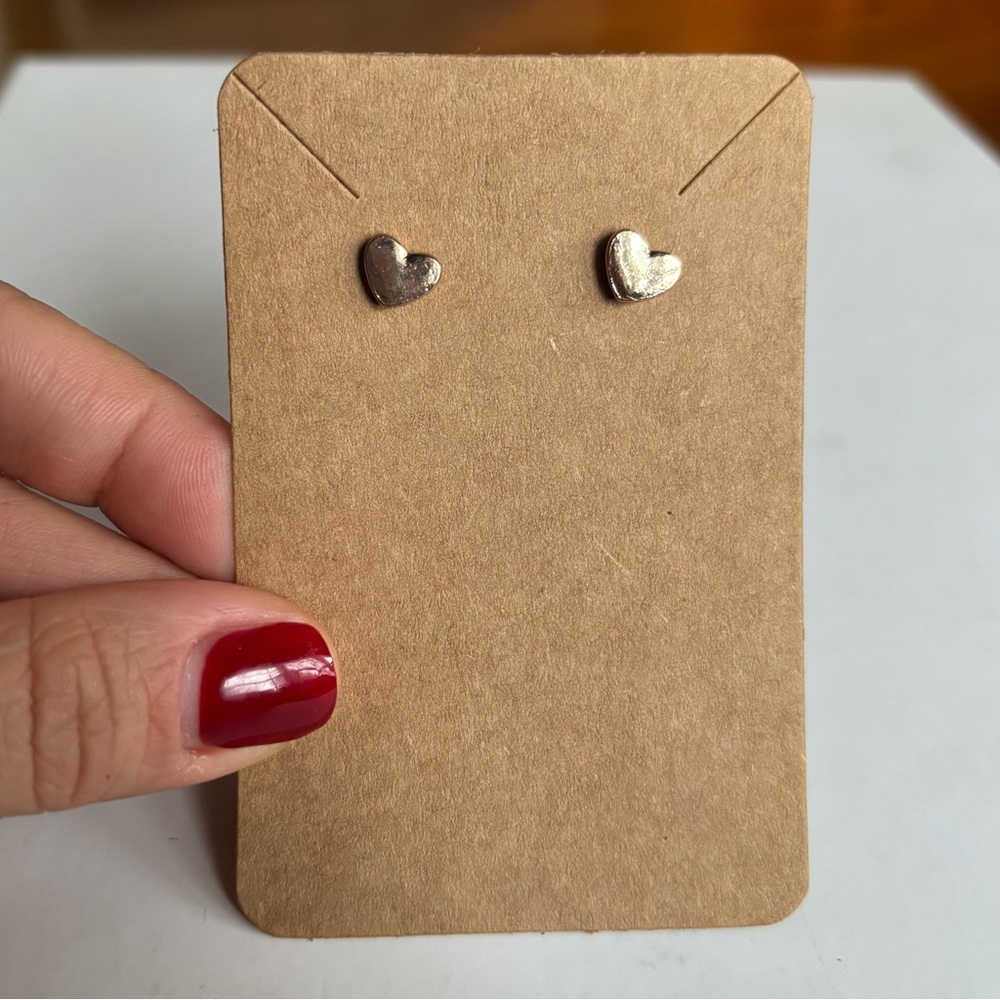 Gold heart stud earrings
